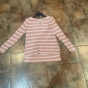 I cannot wear the T-shirt. It’s too low-cut for me.